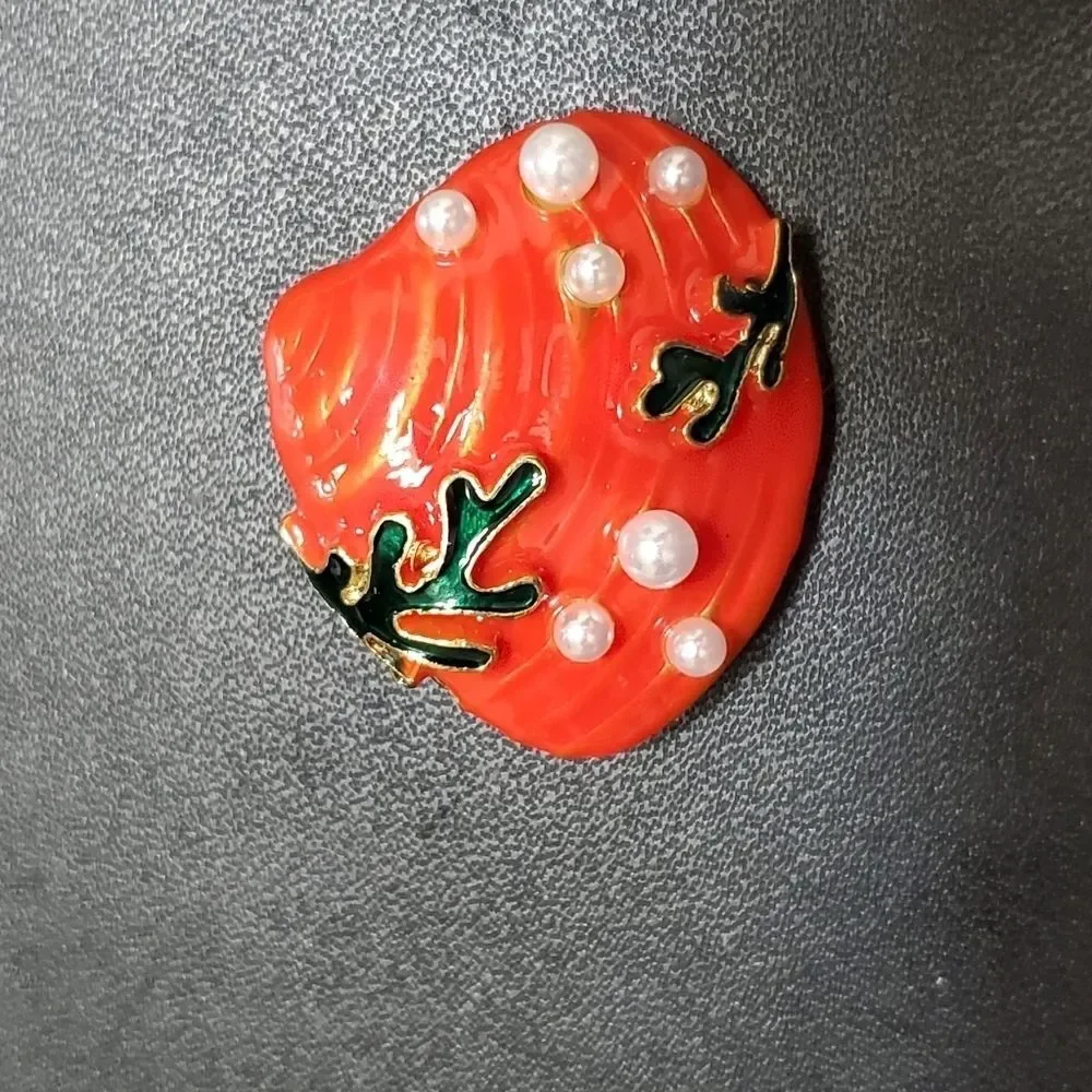Gold tone orange enamel shell brooch faux pearl